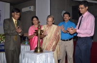 Dr. Mrs. A.B.Desai lighting the inaugural lamp