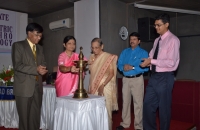 Dr. J.B. Desai (HOD Pediatrics, Municipal Medical College) lighting the inaugural lamp